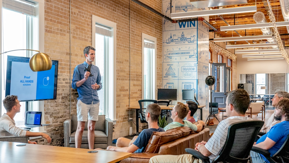 Round-table workshop with professionals discussing AI deliverables